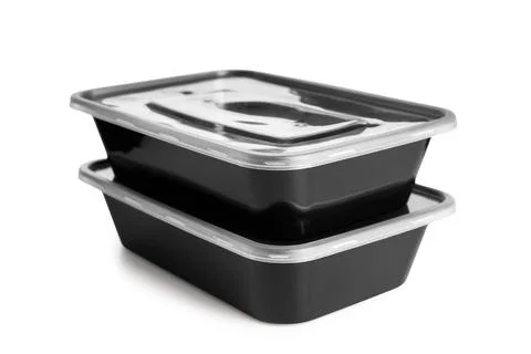 Stack of plastic containers for food isolated on white background, closeup Stock Photos