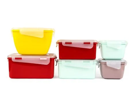 Stack of plastic multi-colored containers for food products isolated Stock Photos