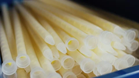 Stack of plastic static mixer nozzles for two component adhesive Stockbeeldmateriaal 155206785