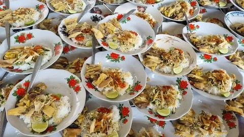 Stack of plates chicken Soto or Soto Ayam in Indonesia. Stock Photos