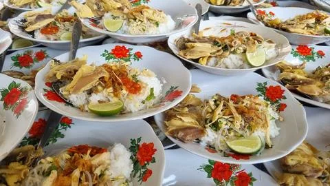 Stack of plates chicken Soto or Soto Ayam in Indonesia. Stock Photos