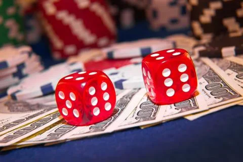 Stack of Poker chips with dice rolls on a dollar bills, Stock Photos