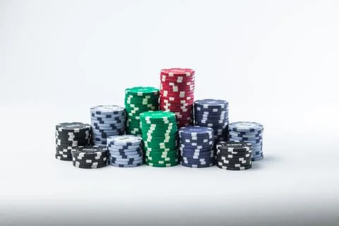 Stack of poker chips on a white background Stock Photos