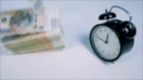 Stack of polish bills and watch Stock Footage 143974339