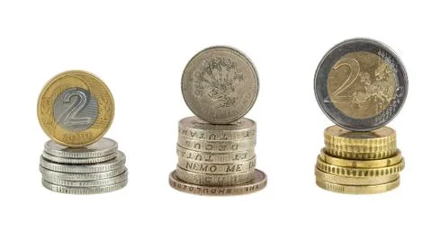 Stack of polish zloty pound and euro coins Stock Photos