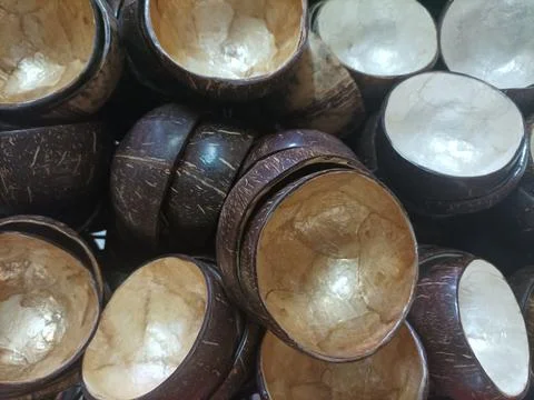 Stack of polished eco-friendly coconut shell bowls Stock Photos