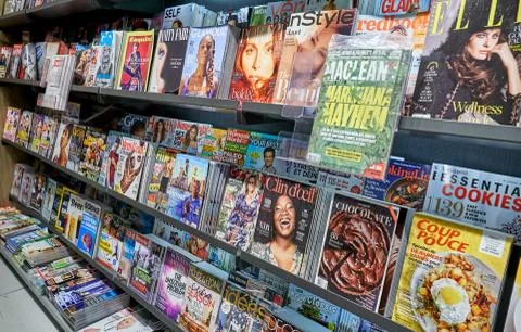 A stack of popular magazines Stock Photos