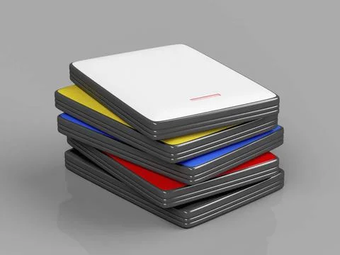 Stack with portable hard drives Stack with portable hard drives with diffe... 写真素材
