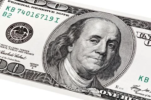 Stack portrait of Benjamin Franklin on one hundred dollars bill. Stock Photos