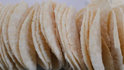 Stack of Potato chips in close view. Slider Shot. Fast food, snacks, treats. Stock Footage 296565983