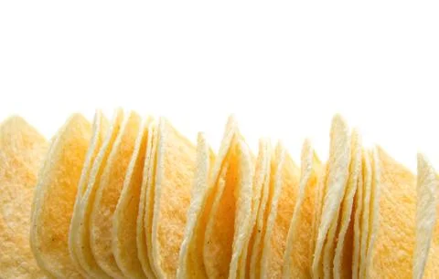 Stack of potato chips isolated on white background Stock Photos