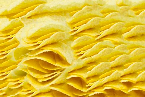 Stack of potato chips on a white Stock Photos