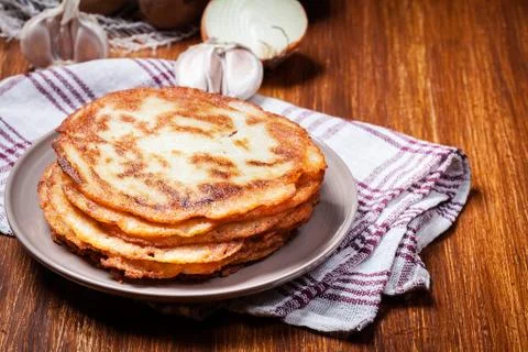 Stack of potato pancakes on a wooden table Stock Photos