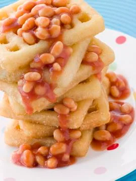 Stack of Potato Waffles with Baked Beans Foto stock