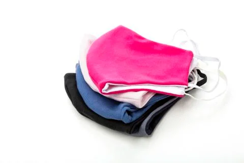 A stack of protective face masks against coronavirus made of dense fabric, is Stock Photos