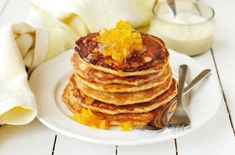 A Stack of Pumpkin Pancakes Topped with Pumpkin-in-Syrup Preserves Stock Photos