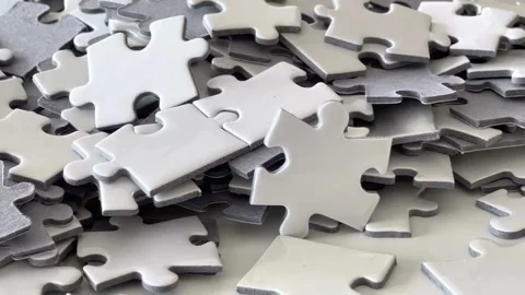 Stack of Puzzle elements create whole jigsaw and later disintegrate in space. Stock Footage 336248527