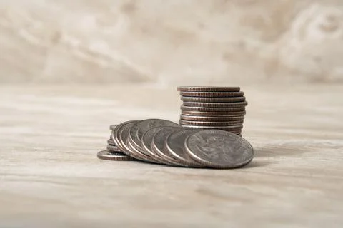 Stack of quarters on a table Stock Photos