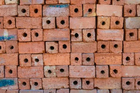 Stack of raw brick. Stock Photos