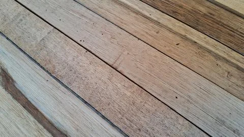 Stack of raw wooden planks. Natural timber boards for construction and carpentry Stock Photos