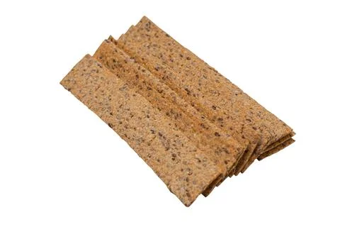 Stack of rectangular bread crisps isolated on white background. Top view clos Stock Photos