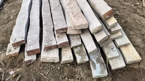 Stack of rectangular natural stone pillars 動画素材 325416368