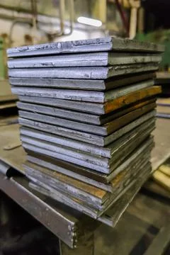 Stack of rectangular thick sheet steel card workpieces, cut with guillotine Foto stock