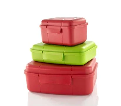 Stack of red and green lunchboxes stack of red and green lunchboxes isolte... 스톡 사진