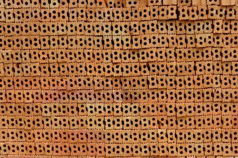 Stack of red bricks, bricks used for building construction Stock Photos