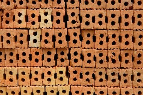 Stack of red bricks, bricks used for building construction Stock Photos