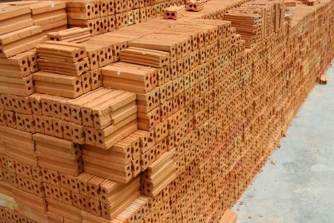 Stack of red bricks, bricks used for building construction Stock Photos