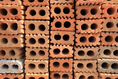Stack of red bricks, bricks used for building construction Stock Photos