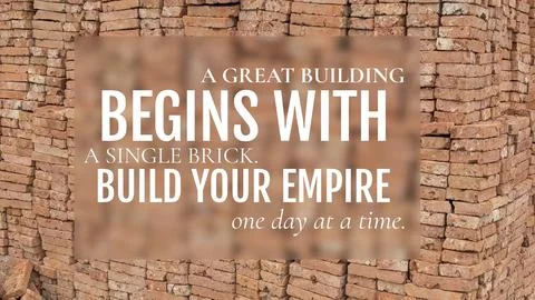 A stack of red bricks forms the background for the quote: "A GREAT BUILDING.. Stock Photos
