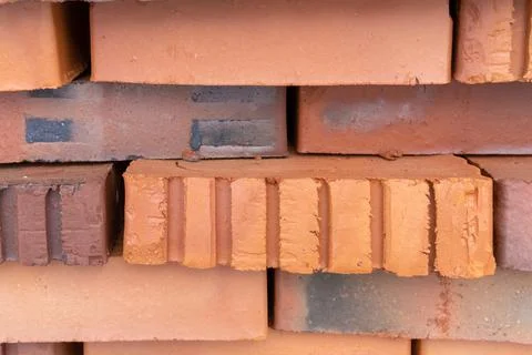 A stack of red bricks. Insulated building bricks. Red clay bricks are stacked 写真素材