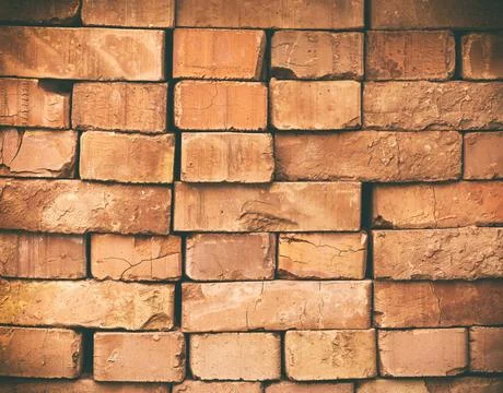 A stack of red bricks stack of red bricks, vintage toning, close up Copyri... Stock Photos