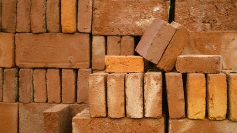 Stack of red bricks textured background Stock Photos