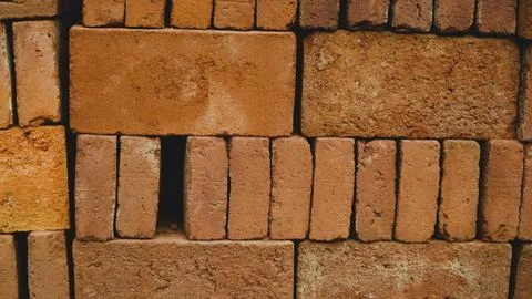 Stack of red bricks textured background 写真素材