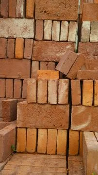 Stack of red bricks textured background Foto stock