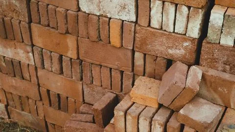 Stack of red bricks textured background Foto stock