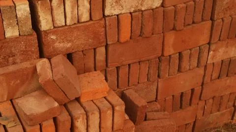 Stack of red bricks textured background Stock Photos