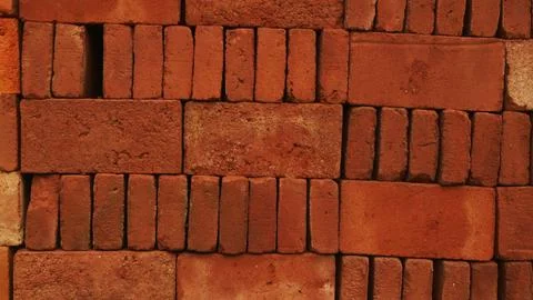 Stack of red bricks textured background Stock Photos