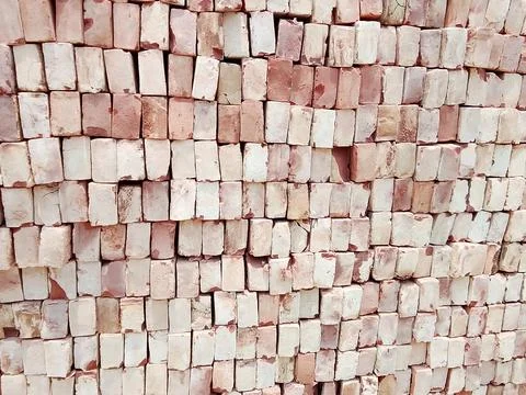 Stack of red clay bricks for construction with construction building material Stock-Fotos