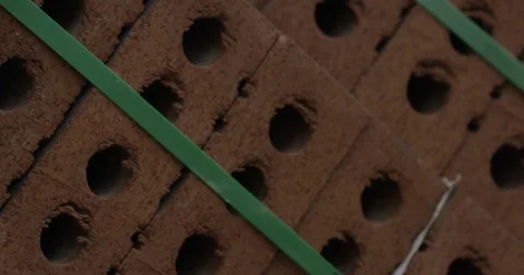 Stack of red clay bricks Stock Footage 79284779