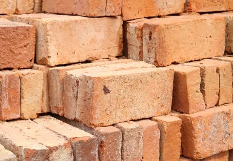 Stack of red clay bricks Stock Photos