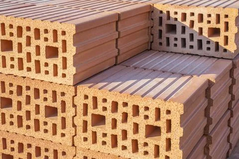 Stack of Red clay Ceramic Thermo Bricks construction material, Work Modular E Stock Photos