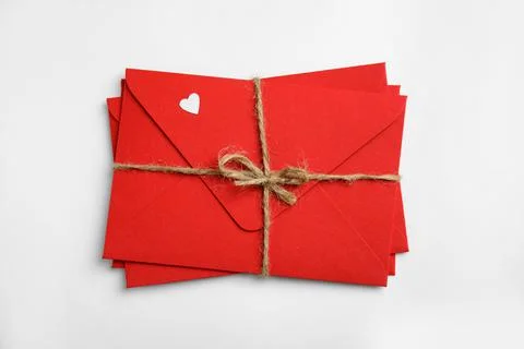 Stack of red envelopes on white background, top view. Love letters 스톡 사진