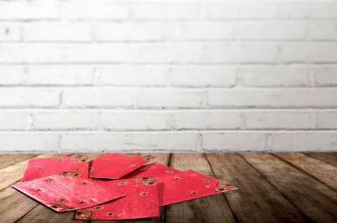 Stack of Red envelopes on wooden tables to celebrate Chinese New Year Foto stock