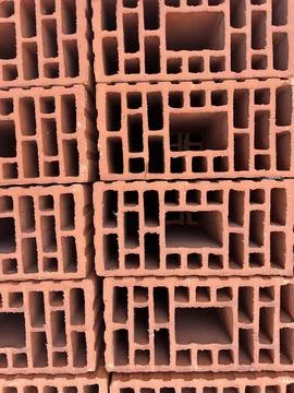 Stack of Red Hollow Clay Bricks Construction Material Stock-Fotos