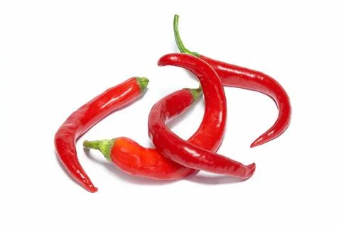 Stack of red hot chili peppers Stack of red hot chili peppers isolated on ... Stock Photos