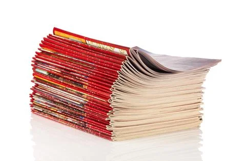 Stack of red magazines on white background isolated Stock Photos